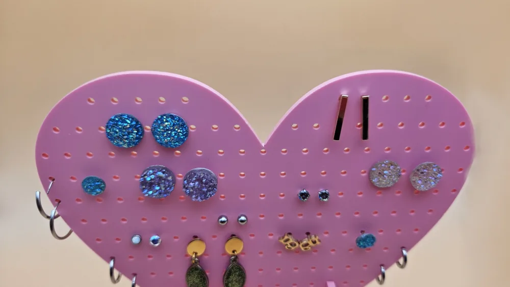 Laser-cut acrylic earring display stand with earrings